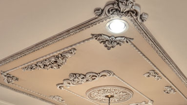 Decorative ceiling with accent pieces and molding